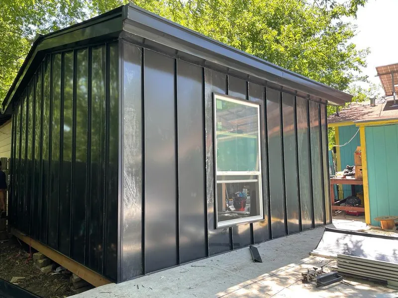 Black standing seam metal wall panels for Roof Inspection in Kerrville