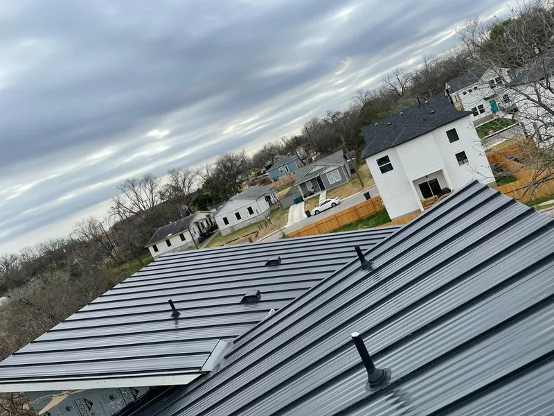 Standing seam metal roof panels with vents for Skylight Repair in Kerrville